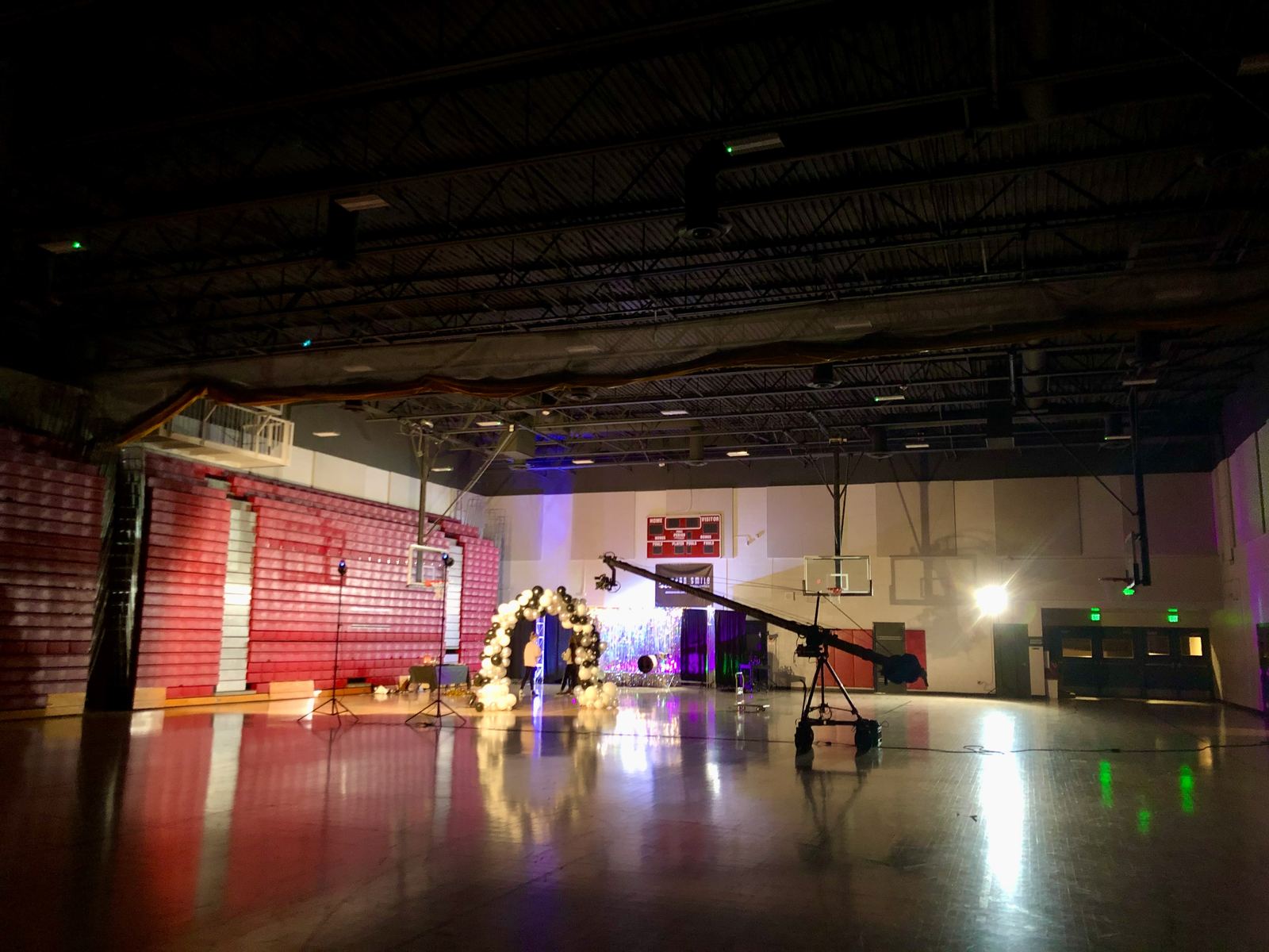 Brock Monroe, "Good Old Days" — Director of Photography (drone) and camera operator. Behind the scenes inside: a large hall with a glossy floor, figures under coloured light.
