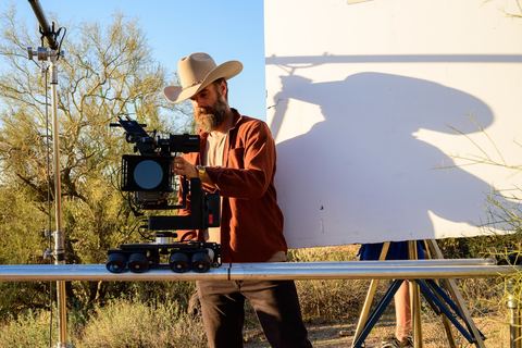 2025 Qava TV - Dolly - cinema camera on a track on a desert location.