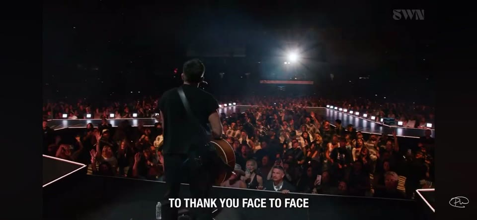 Summer Worship Nights Tour (2025) — Steadicam. Behind the player, out over the arena, with the tour mark and a lyric line left in the picture.